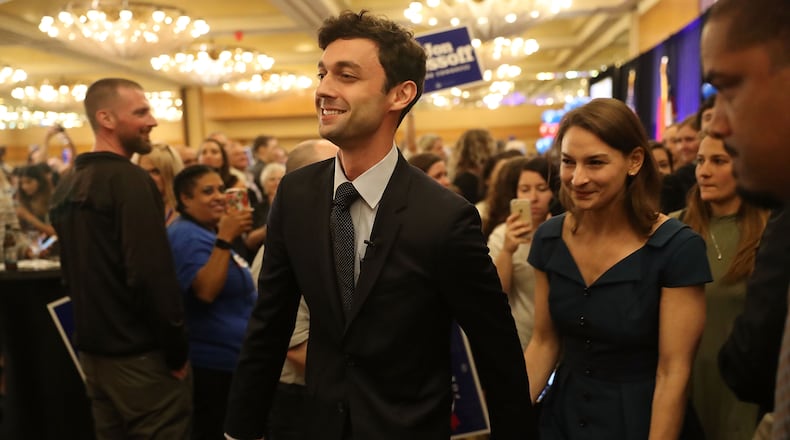 ATLANTA, GA - APRIL 18: Democratic candidate Jon Ossoff walks with his girlfriend Alisha Kramer after speaking to his supporters as votes continue to be counted in a race that was too close to call for Georgia's 6th Congressional District in a special election to replace Tom Price, who is now the secretary of Health and Human Services on April 18, 2017 in Atlanta, Georgia. The winner of the race would fill a congressional seat that has been held by a Republican since the 1970s. (Photo by Joe Raedle/Getty Images)
