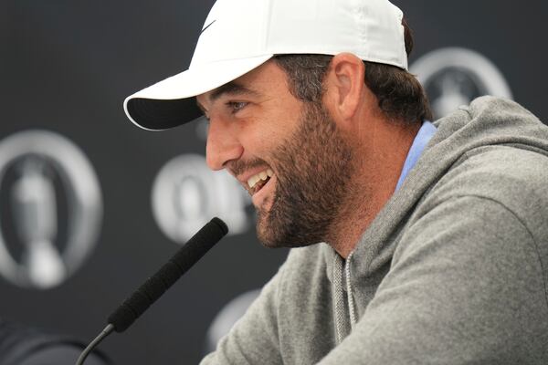 Scottie Scheffler of the United States speaks during press conference ahead of the British Open golf championship at the Royal Portrush Golf Club, Northern Ireland, Tuesday, July 15, 2025. The Open starts Thursday. (AP Photo/Francisco Seco)