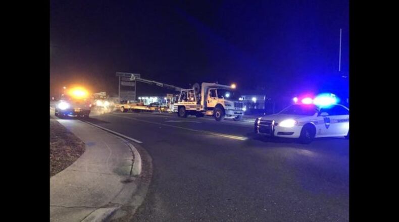 A Jacksonville Sheriff's Office officer was injured early Christmas morning after a shooting led to a police chase