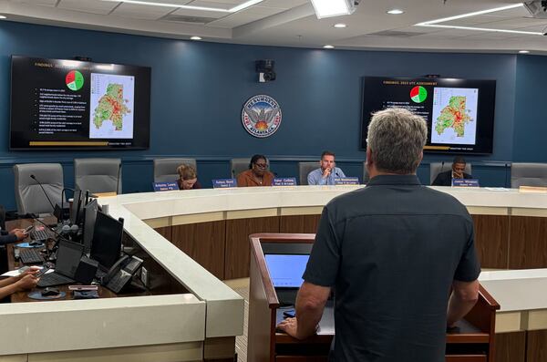 Georgia Tech professor Tony Giarrusso presents his tree canopy report to Atlanta City Council members. Tree coverage over the city dropped almost a percentage point to 45.7% during the years 2018 to 2023. (Bill Torpy/AJC)