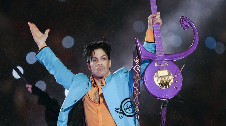 In this Feb. 4, 2007 file photo, Prince performs during the halftime show of the Super Bowl XLI football game at Dolphin Stadium in Miami. He died from an accidental overdose on fentanyl in April. (AP Photo/Chris O’Meara, File)