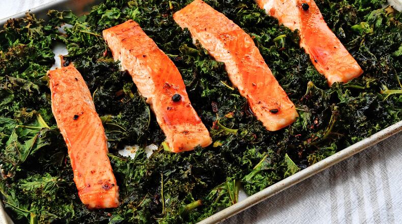 Roasted Salmon and Kale with Chili Crisp. (Chris Hunt for The Atlanta Journal-Constitution)