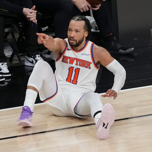 New York Knicks guard Jalen Brunson motion after a basket against the San Antonio Spurs during the second half of Game 1 of the NBA Finals basketball series, Wednesday, June 3, 2026, in San Antonio. (AP Photo/Eric Gay)