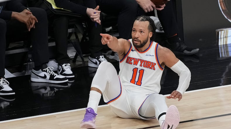 New York Knicks guard Jalen Brunson motion after a basket against the San Antonio Spurs during the second half of Game 1 of the NBA Finals basketball series, Wednesday, June 3, 2026, in San Antonio. (AP Photo/Eric Gay)