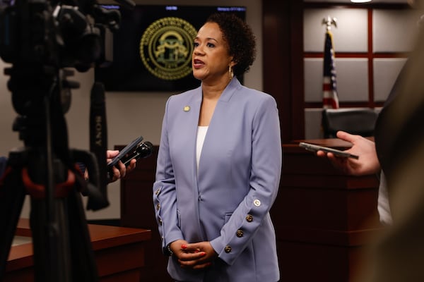 Georgia Public Service Commissioner Alicia Johnson speaks to news media after being sworn in at PSC headquarters in Atlanta on Monday, Dec. 29, 2025. (Natrice Miller/AJC)