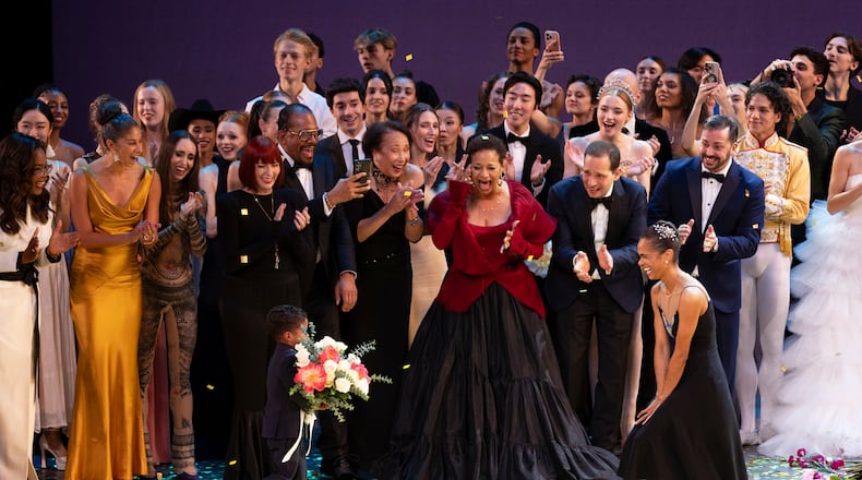 Dancer Misty Copeland, right, takes a bow during curtain calls with her son, Jackson, at her retirement performance from American Ballet Theatre at the David H. Koch Theater at Lincoln Center, Wednesday, Oct. 22, 2025, in New York. (Rosalie O'Connor via AP)