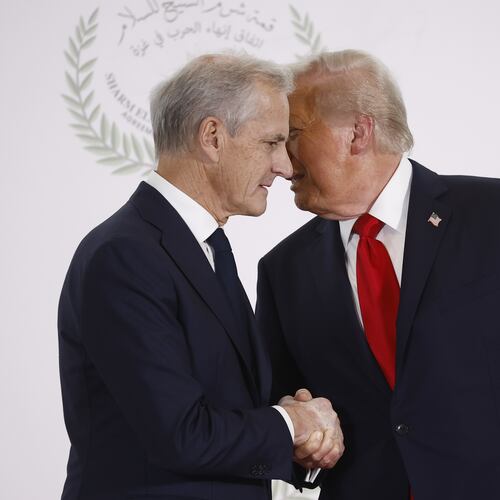 FILE - President Donald Trump and Norway's Prime Minister Jonas Gahr Store shake hands during the group photo at the Gaza International Peace Summit in Sharm el-Sheikh, Egypt, Oct.13 2025. (Yoan Valat, Pool photo via AP, File)