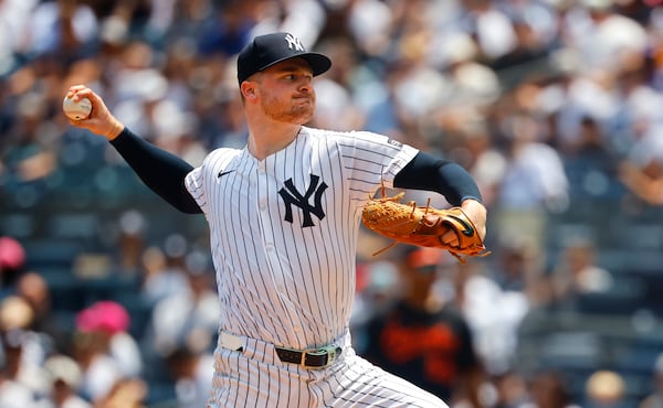 New York Yankees pitcher Clarke Schmidt (36) throws during the first inning of a baseball game against the Baltimore Orioles, Saturday, June 21, 2025, in New York. (AP Photo/Noah K. Murray)