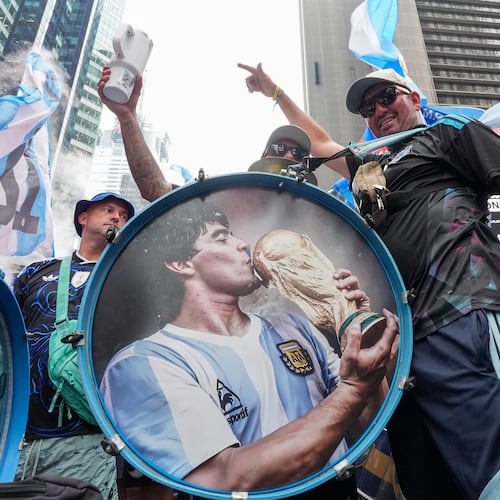 Argentina fans gather for a rally on the eve of the World Cup final soccer match in New York's Times Square, Saturday, July 18, 2026 (AP Photo/Frank Franklin II)