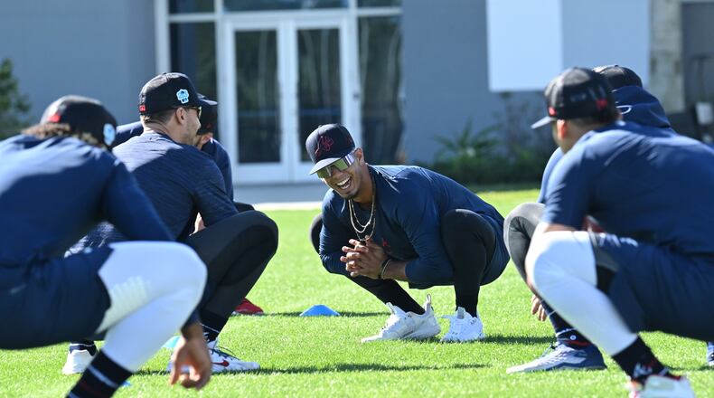 Braves shortstop Vaughn Grissom smiles as he and his teammates warm up during spring training at CoolToday Park in North Port, Florida. (Hyosub Shin / Hyosub.Shin@ajc.com)