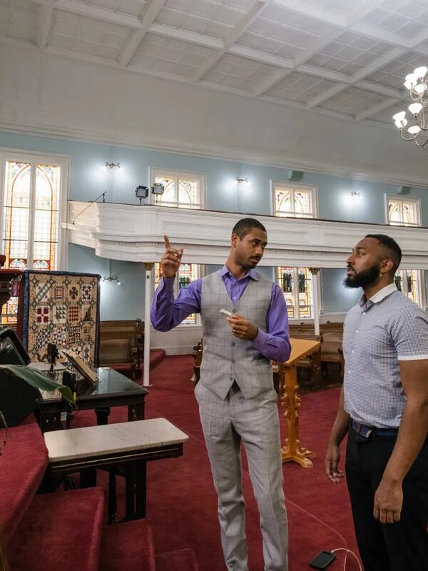 Anthony Kinslow, left, discusses an ongoing energy audit at First African Baptist Church with Engineering Intern Alphonse Houndegla. (Photo Courtesy of Justin Taylor/The Current)