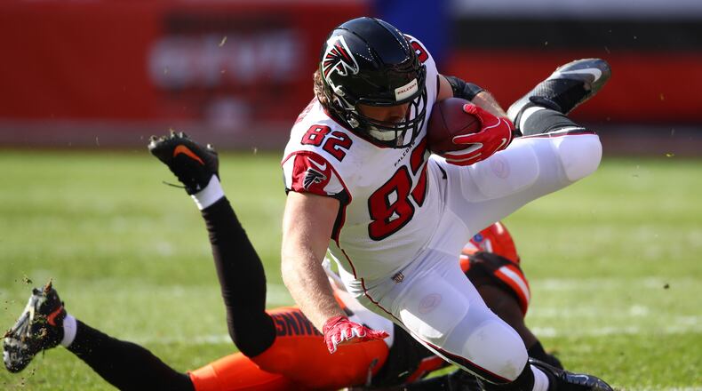 CLEVELAND, OH - NOVEMBER 11: Logan Paulsen #82 of the Atlanta Falcons hits the ground after being tackled by Derrick Kindred #26 of the Cleveland Browns in the first half at FirstEnergy Stadium on November 11, 2018 in Cleveland, Ohio. (Photo by Gregory Shamus/Getty Images)