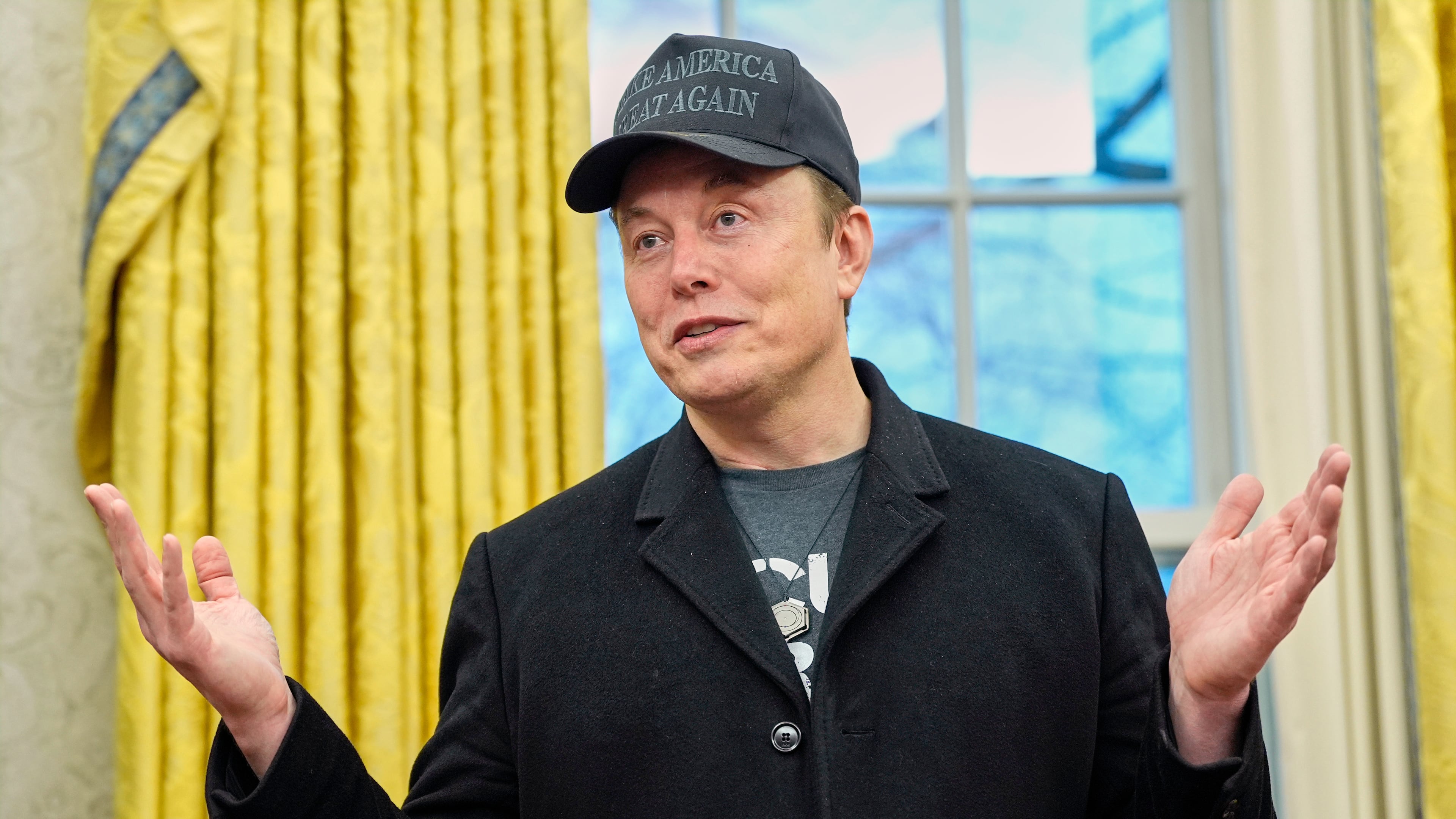 FILE - Elon Musk speaks during an event with President Donald Trump in the Oval Office at the White House, Feb. 11, 2025, in Washington. (AP Photo/Alex Brandon, File)