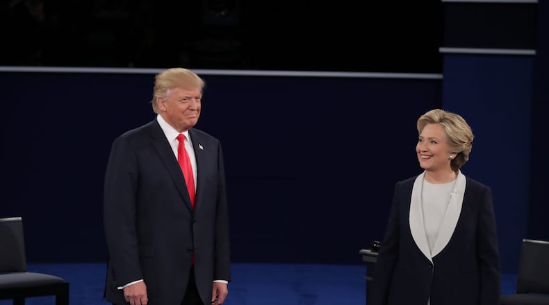 ST LOUIS, MO - OCTOBER 09: Democratic presidential nominee former Secretary of State Hillary Clinton and Republican presidential nominee Donald Trump arrive for the town hall debate at Washington University on October 9, 2016 in St Louis, Missouri. This is the second of three presidential debates scheduled prior to the November 8th election. (Photo by Chip Somodevilla/Getty Images)