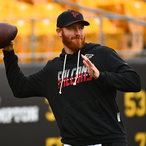 Falcons quarterback Cooper Rush (13) warms up before an NFL football game Pittsburgh Steelers, Sunday, Sept. 13, 2026, in Pittsburgh. (AP Photo/Justin Berl)