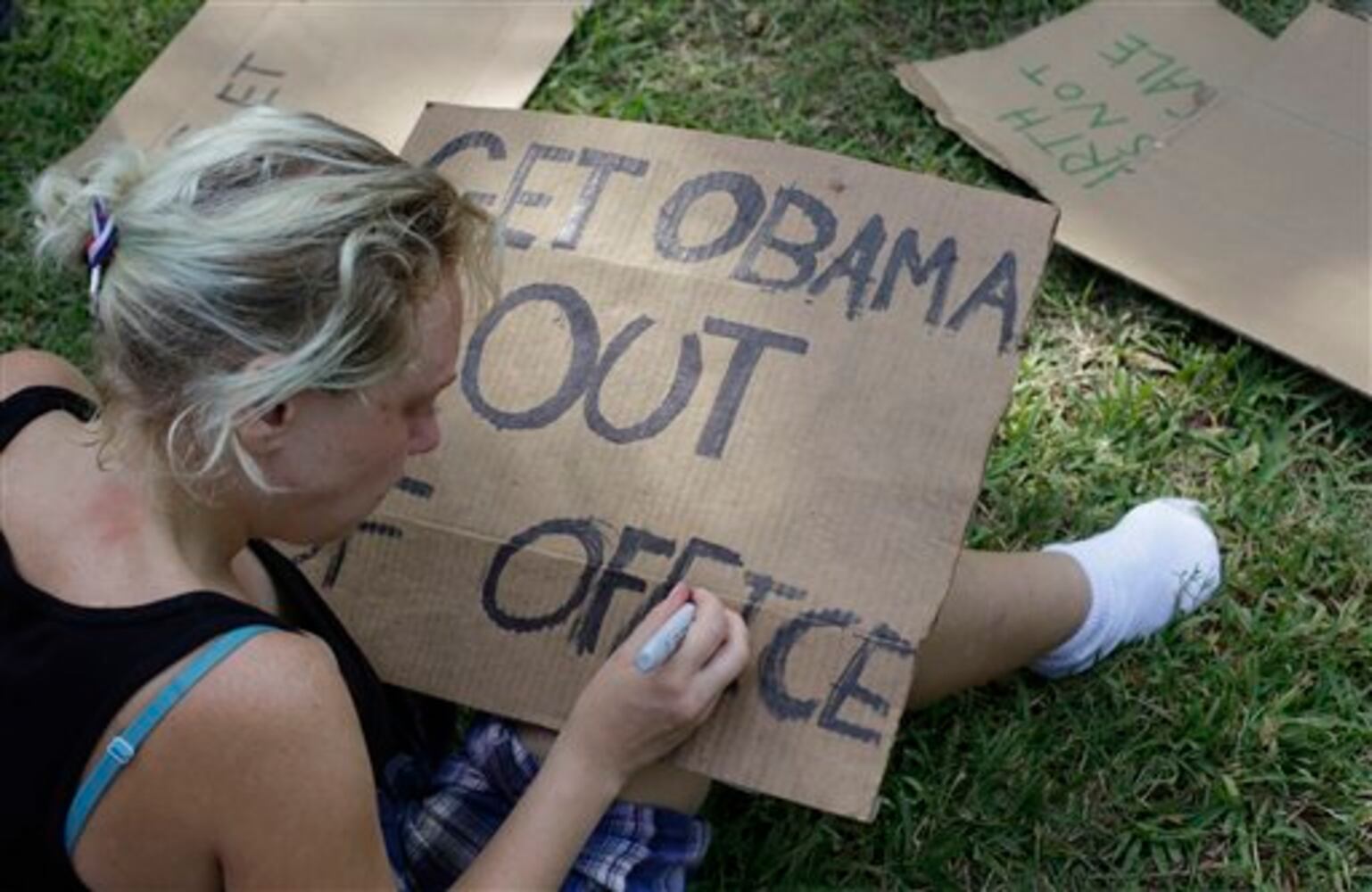 Signs seen for and against DNC in Charlotte