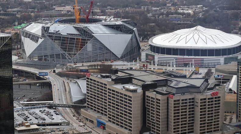 Construction continues on Mercedes-Benz Stadium, next door to the Georgia Dome. (Curtis Compton/ccompton@ajc.com)