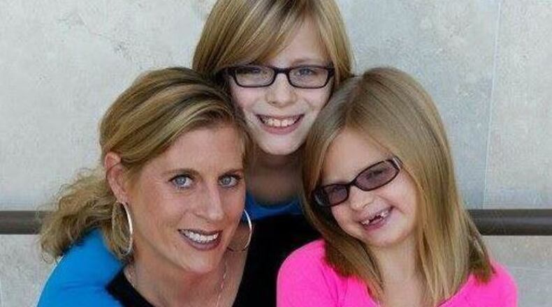 Kathy Patterson and her 9- and 12-year-old daughters were killed Feb. 9 when a fire broke out at their Tucker-area home. (Credit: Channel 2 Action News)