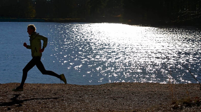 18-year-old Darr Smith, of Atlanta, is shown running at Murphey Candler Park Thursday December 15, 2016, in Atlanta, Ga.