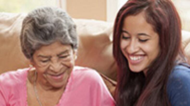 Senior citizens can learn from high school seniors how to operate technological devices through a new program called Senior to Senior Technology Help. (Courtesy of Cobb County)