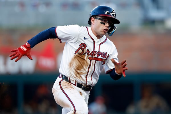 Atlanta Braves' Alex Verdugo rounds third to score after a double by Austin Riley during the third inning of a baseball game against the Cincinnati Reds, Monday, May 5, 2025, in Atlanta. (AP Photo/Butch Dill)