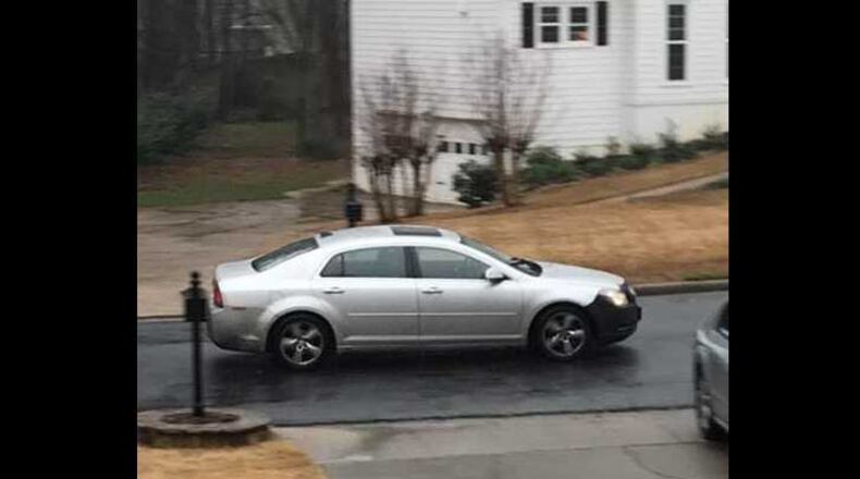 Police in Alpharetta are searching for a man who was seen going through mailboxes in the Pine Grove neighborhood on Monday.