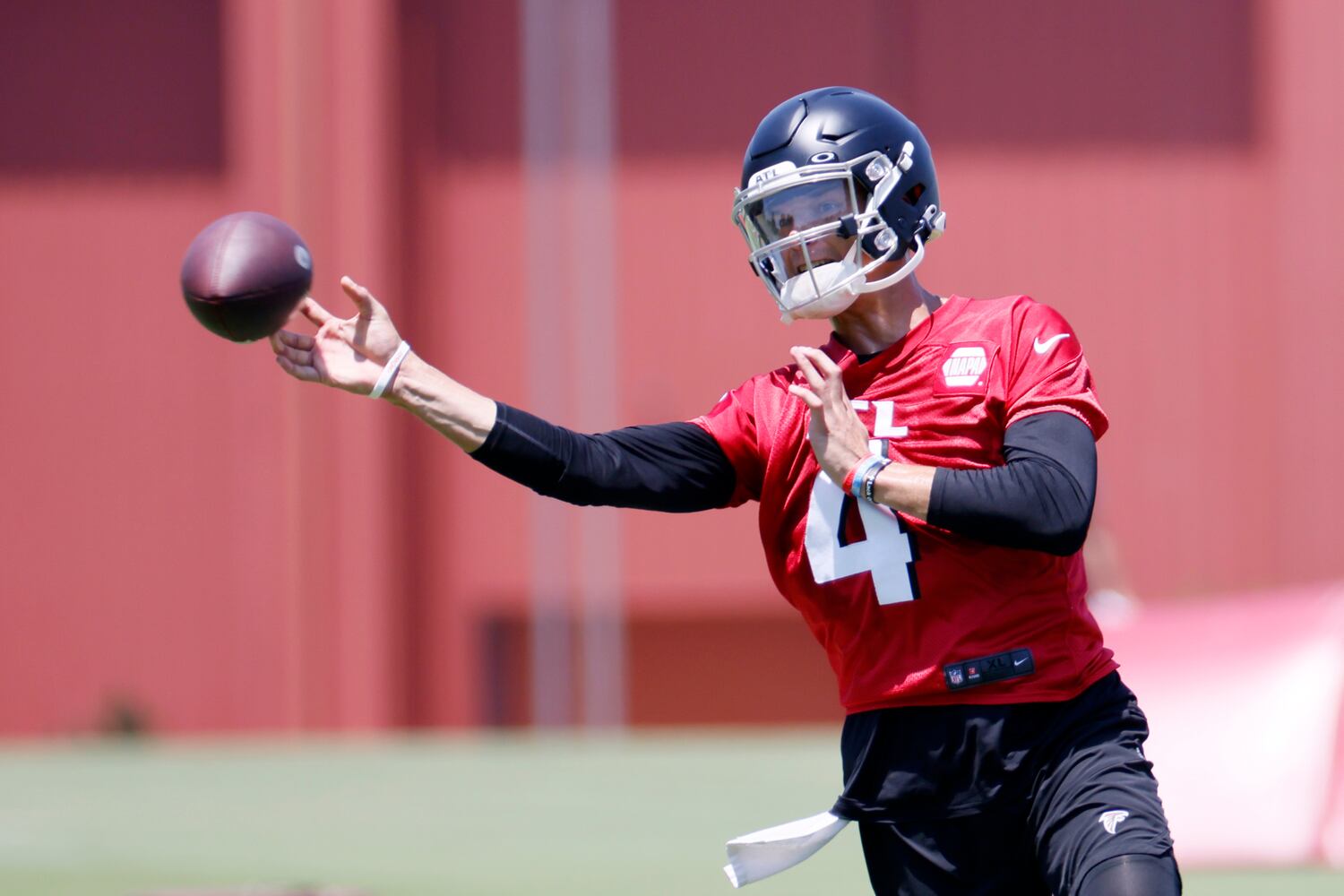 Falcons quarterback Desmond Ridder(4) is shown during minicamp at the Atlanta Falcons Training Facility Wednesday, June 15, 2022, in Flowery Branch, Ga. Miguel Martinez / miguel.martinezjimenez@ajc.com