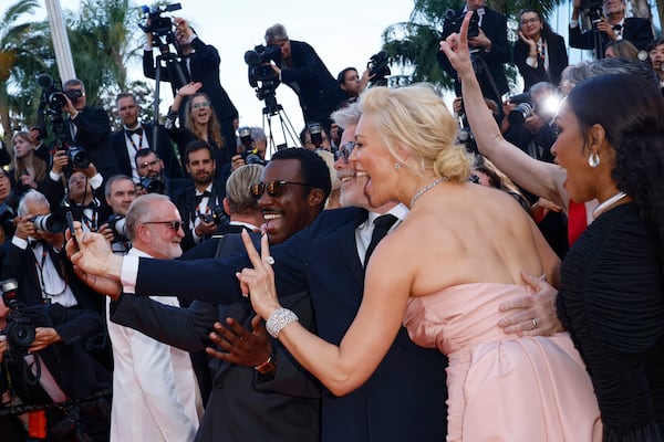 Tramell Tillman, from left, director Christopher McQuarrie, Hannah Waddingham, and Angela Bassett take a selfie upon arrival for the premiere of the film 'Mission: Impossible - The Final Reckoning' at the 78th international film festival, Cannes, southern France, Wednesday, May 14, 2025. (Photo by Joel C Ryan/Invision/AP)