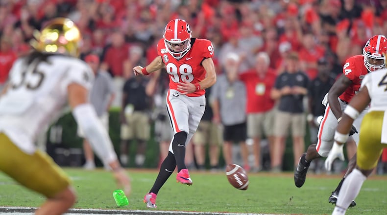Georgia place kicker Rodrigo Blankenship (98) kicks off during the second half at Sanford Stadium in Athens on Saturday, Sept. 21, 2019. Georgia defeated Notre Dame 23-17.