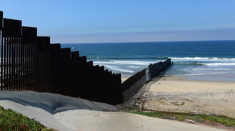 The US-Mexico 'border-fence' runs some three hundred feet into the Pacific Ocean in this most southwestern corner of the mainland United States, across from Playas de Tijuana, Mexico (FREDERIC J. BROWN/AFP/Getty Images)