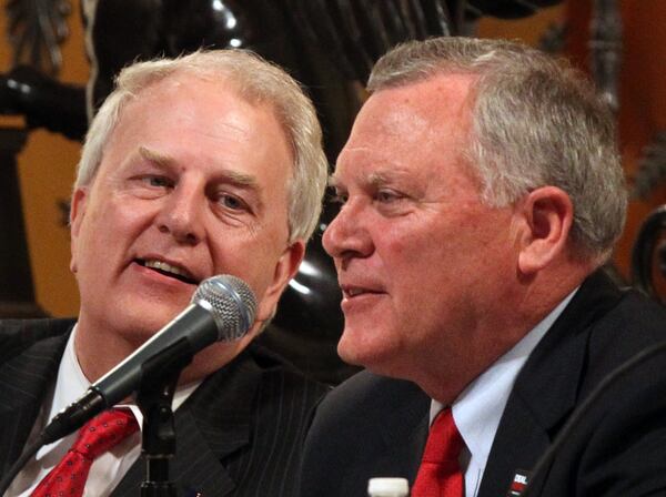 Former Govs. Roy Barnes (left) and Nathan Deal, seen here at a debate in 2010. (AJC FILE)