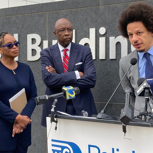 FILE - Comedian Eric André, right, speaks at a news conference outside the federal courthouse in Atlanta on Oct. 11, 2022, as his attorneys Allegra Lawrence-Hardy, left, and Richard Deane watch. (AP Photo/Kate Brumback, File)