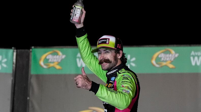 Ryan Blaney celebrates after winning a NASCAR Cup Series auto race, Sunday, July 12, 2026, in Hampton, Ga. (AP Photo/Mike Stewart)