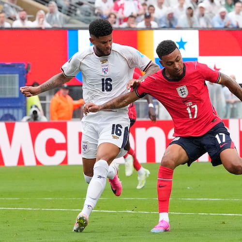 England's Morgan Rogers (17) and Panama's Andres Andrade (16) battle for the ball during the World Cup Group L soccer match between Panama and England in East Rutherford, N.J., near New York, Saturday, June 27, 2026. (AP Photo/Yuki Iwamura)