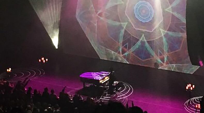 Prince plays during his first of two shows April 14, 2016, at the Fox Theatre in Atlanta.