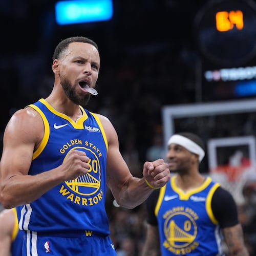 Golden State Warriors guard Stephen Curry (30) reacts after making a free-throw for the team's win over the San Antonio Spurs in an NBA Cup basketball game in San Antonio, Friday, Nov. 14, 2025. (AP Photo/Eric Gay)