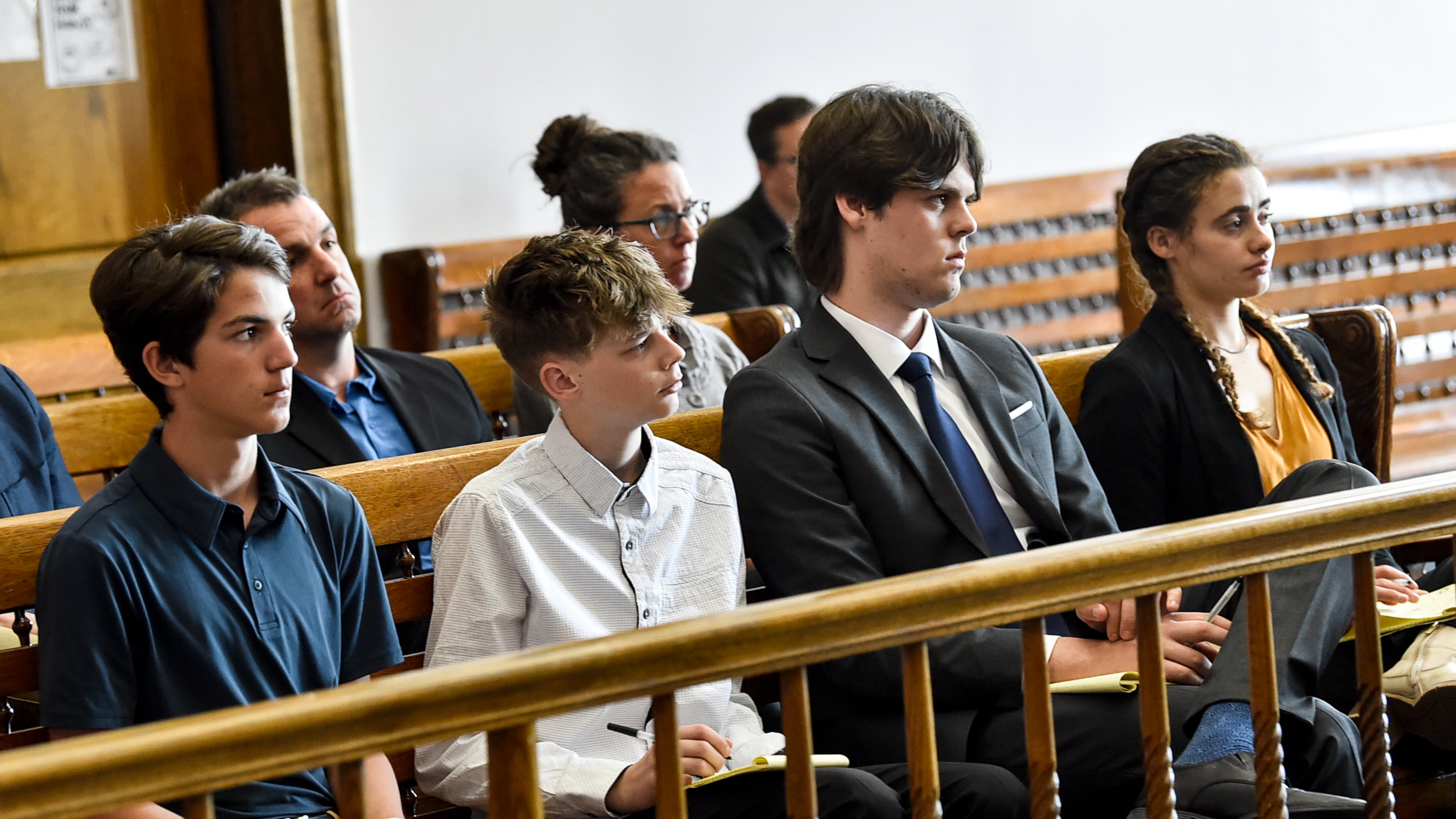 FILE - Plaintiffs in a climate lawsuit brought by children and young adults in Montana listen to arguments during a May 12, 2023, court hearing in Helena, Mont. (Thom Bridge/Independent Record via AP, file)/
