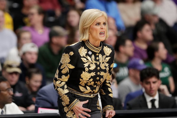 LSU head coach Kim Mulkey directs her team during the first half against North Carolina State, in the Sweet 16 of the NCAA college basketball tournament Friday, March 28, 2025, in Spokane, Wash. (AP Photo/Young Kwak)