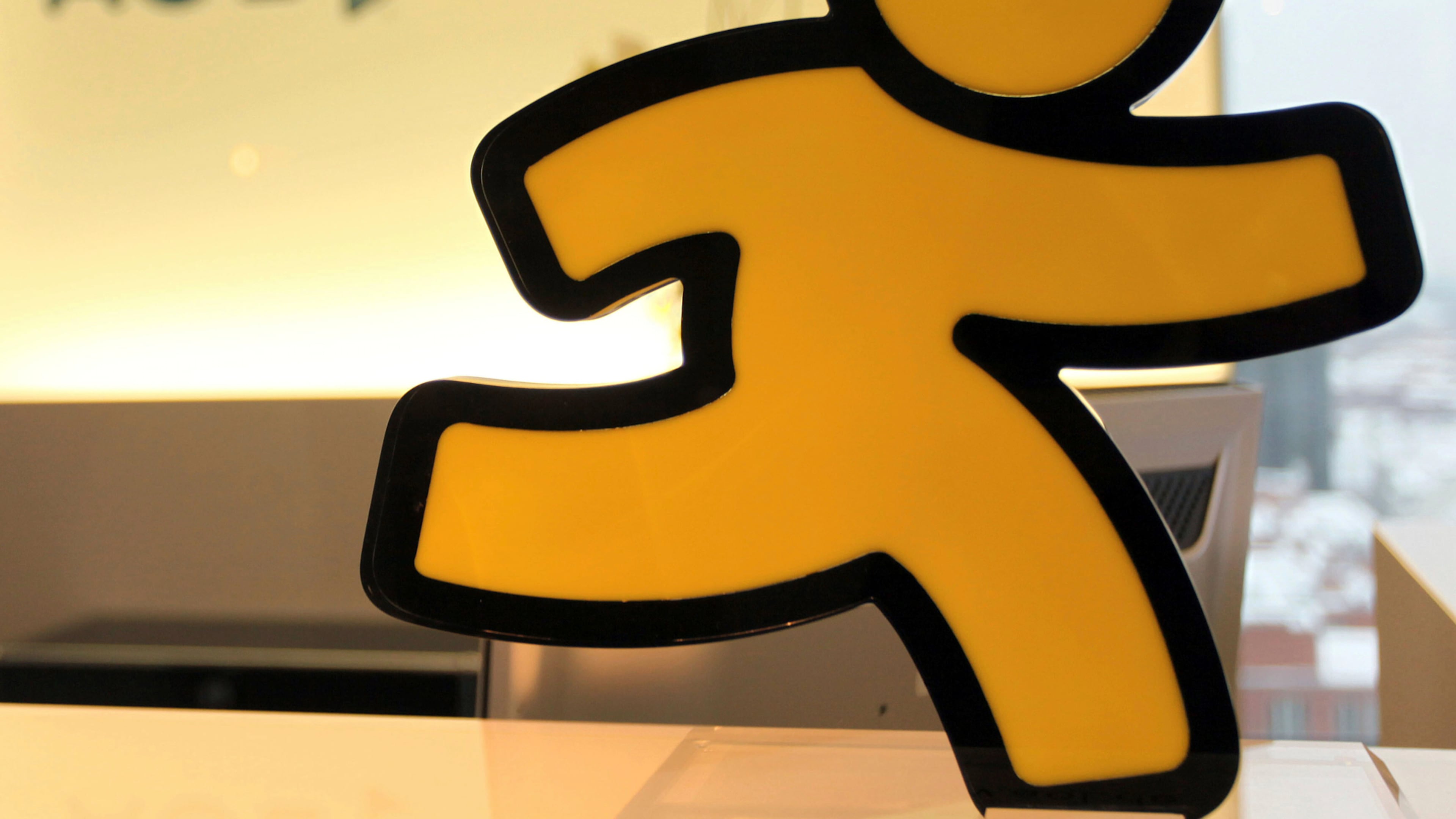 FILE - An AOL logo is seen in the company's office in Hamburg, Germany, Jan. 12, 2010. (AP Photo/Axel Heimken, File)