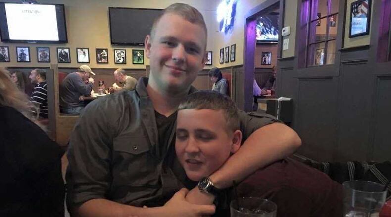 Jack "Deacon" Harris plays around with his younger brother, Garrett. They died together on the drive back from Cobb County to Georgia Southern University on I-16 early the Sunday after Thanksgiving 2017.