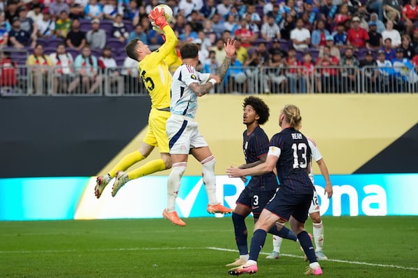 United States goalkeeper Matthew Freese (25) stops a shot during the second half of a CONCACAF Gold Cup quarterfinals soccer match against Costa Rica, Sunday, June 29, 2025, in Minneapolis. (AP Photo/Abbie Parr)