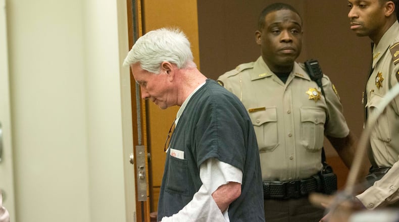 05/23/2018 -- Atlanta, GA -- Claud "Tex" McIver is escorted out of the courtroom after being sentenced to life in prison with the possibility of parole in front of Fulton County Chief Judge Robert McBurney at the Fulton County courthouse in Atlanta, Wednesday, May 23, 2018. ALYSSA POINTER/ATLANTA JOURNAL-CONSTITUTION