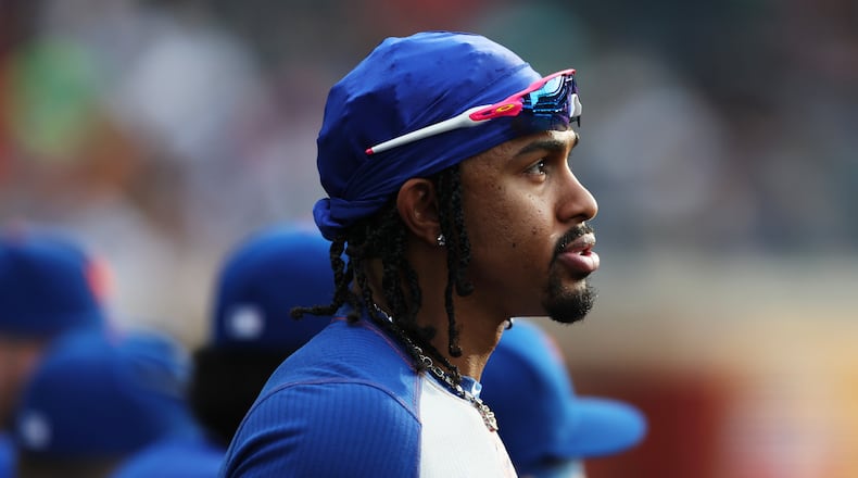 An inured Francisco Lindor looks on from the New York Mets dugout during the eighth inning of a baseball game against the Cincinnati Reds, Monday, May 25, 2026, in New York. (AP Photo/Heather Khalifa)