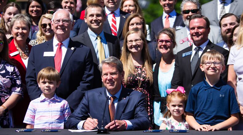 Gov. Brian Kemp attends the Children, Family and School Choice Bill Signing Ceremony on Thursday, May 6, 2021, in Liberty Plaza at the Georgia State Capitol in Atlanta. One size does not fit all when it comes to learning, writes Nicole P. Doyle. (Christina Matacotta for the AJC 2021)