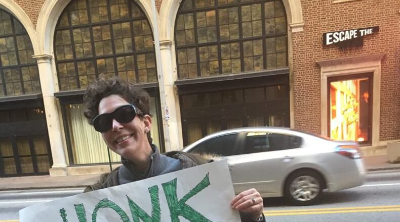 Georgians opposed to Betsy DeVos took their fight to the Senate offices of David Perdue this week. (Elizabeth Lenhard photo.)