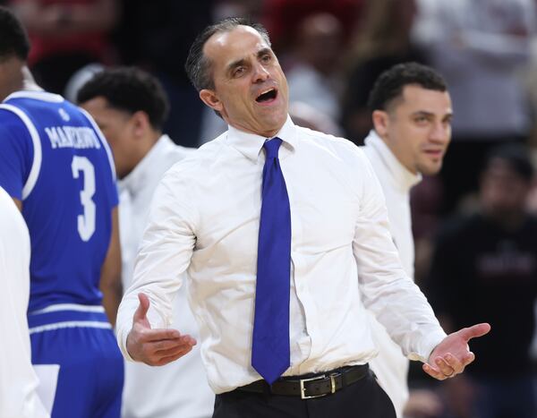 Drake head coach Ben McCollum speaks to the referee after a technical foul during the second half against Texas Tech in the second round of the NCAA college basketball tournament, Saturday, March 22, 2025, in Wichita, Kan. (AP Photo/Travis Heying)