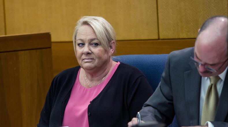 Mye Brindle, former housekeeper for Waffle House Chairman Joe Rogers Jr. and defendant in the sex tape case, listens to the testimony of Rogers  in the Fulton County Courthouse Wednesday, April 4, 2018. STEVE SCHAEFER / SPECIAL TO THE AJC