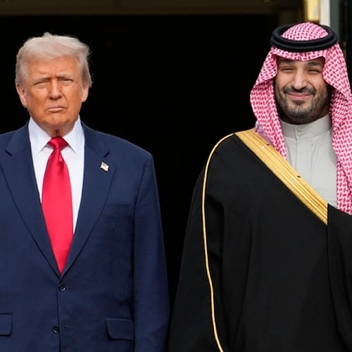 FILE - President Donald Trump stands with Saudi Arabia's Crown Prince Mohammed bin Salman on his visit to the White House, Nov. 18, 2025, in Washington. (AP Photo/Mark Schiefelbein, File)