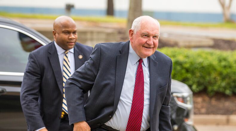 04/05/2019 -- Newnan, Georgia -- United States Secretary of Agriculture Sonny Perdue (center) arrives at the U.S. Department of Agriculture's National Detector Dog Training Facility in Newnan, Friday, April 5, 2019. (ALYSSA POINTER/ALYSSA.POINTER@AJC.COM)