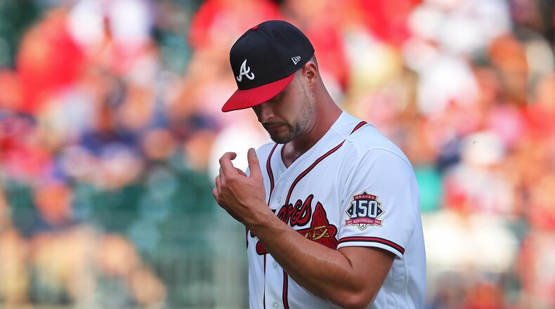 Braves starting pitcher Kyle Muller reacts after giving up a grand slam to Cincinnati Reds outfielder Jesse Winker during the second inning. “Curtis Compton / Curtis.Compton@ajc.com”
